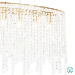 Détail du lustre en cristal et métal doré avec pampilles scintillantes