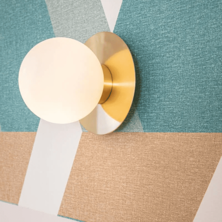 applique murale ronde dorée